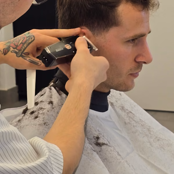 Close-up of a fade being refined with the clipper